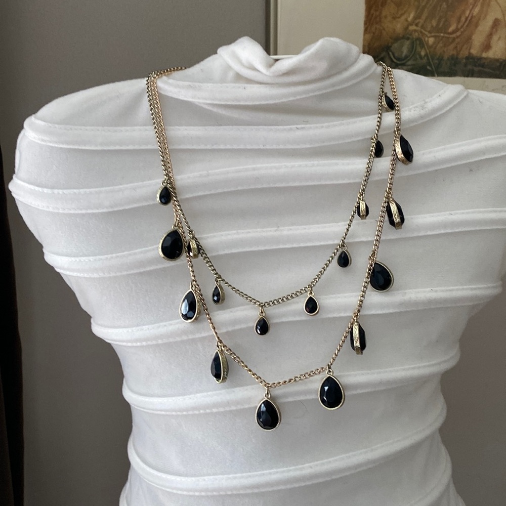 Necklace with black tearlike drops in two different sizes